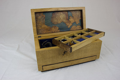 Insert tray with divisions inside solid oak jewellery box by Reuben's woodcraft.
