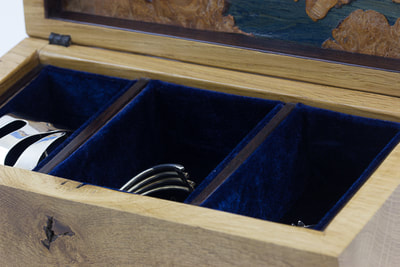 Oak jewellery box compartments lined with blue velvet. By Reuben's woodcraft